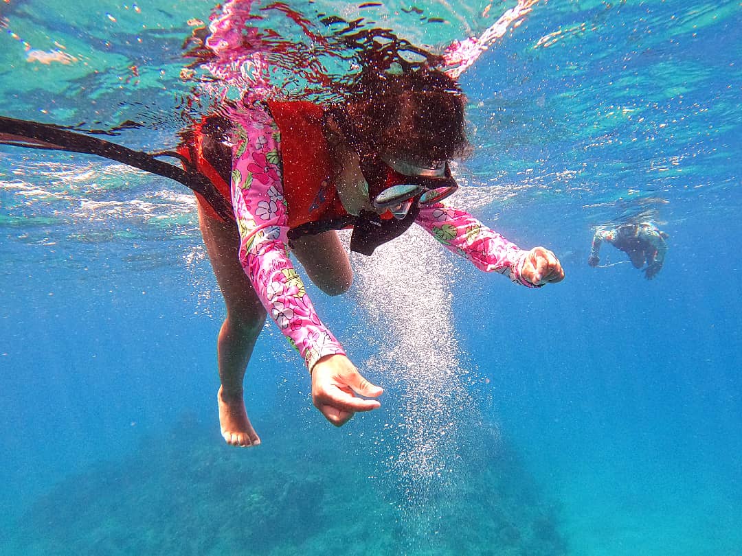 Snorkeler swimming in Sosua Bay